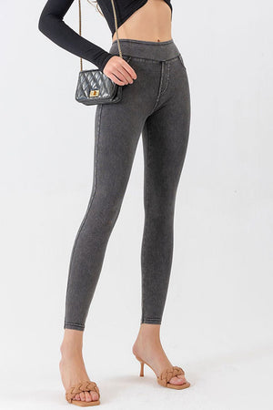 Dark gray denim-effect leggings with a high waist and slim fit.