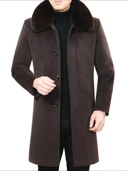 Men's brown buttoned overcoat with a luxurious fur collar.