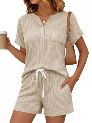 Apricot ribbed knit loungewear set with henley neckline, chest pocket, and drawstring shorts.