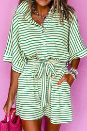 Striped green and cream resort shirt romper with tie waist and button front.