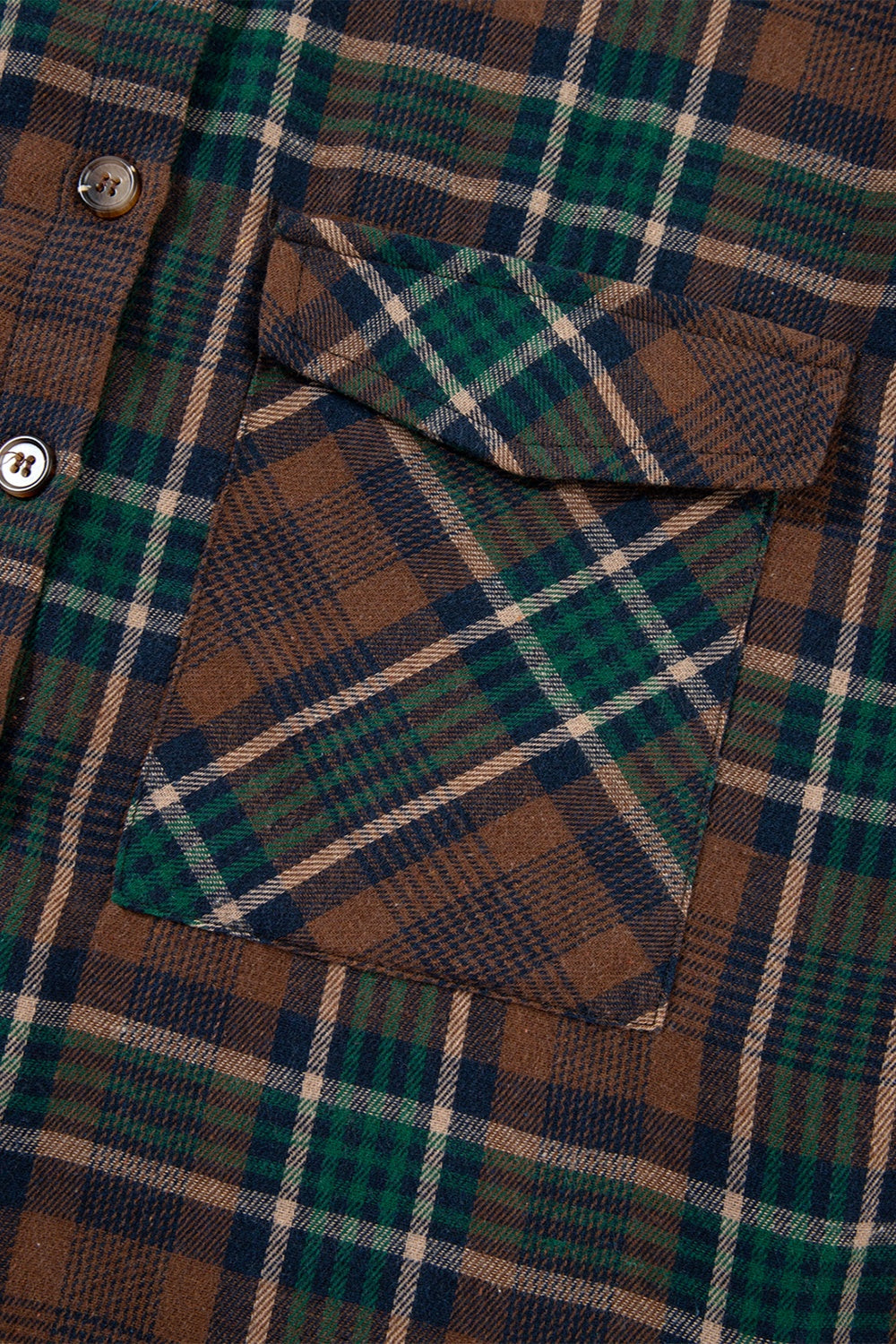 Plaid snap jacket in caramel with chest pocket and button detail.