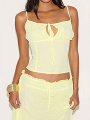 Apricot cami set with tie front and ruffled maxi skirt.