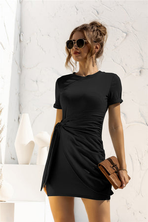 Black jersey mini dress with short sleeves and a draped knot-front detail.