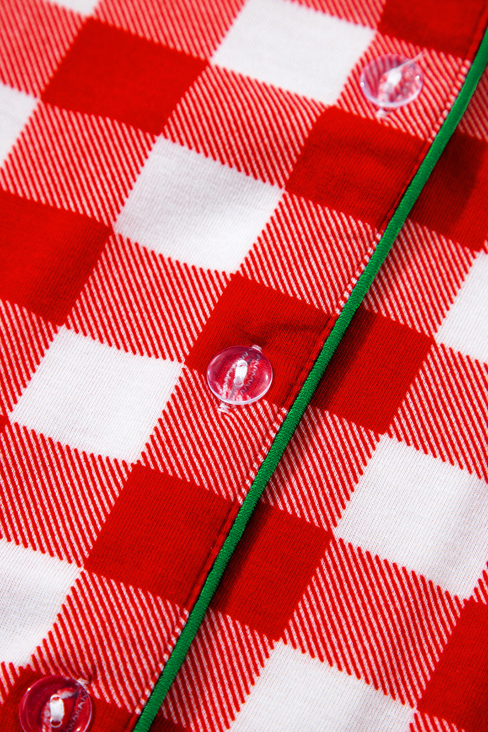 Red and white gingham pajama set with green trim and clear buttons.
