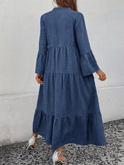 Blue tiered ruffle hem maxi dress with bell sleeves and button front.