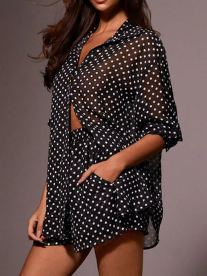 Black sheer polka dot two-piece set with button-up shirt and shorts.