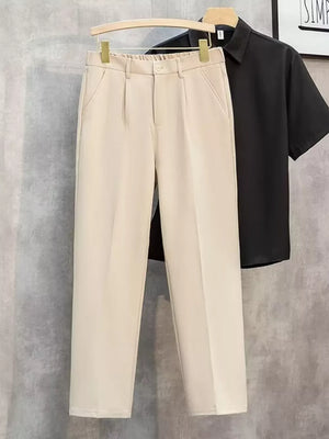 Khaki straight-leg cargo pants with elastic waistband and button closure.