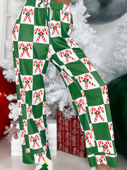 Green checkered pajama pants with candy cane print and drawstring waist