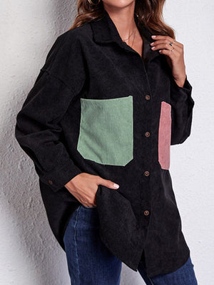 Black corduroy overshirt with contrast patch pockets in mint green and pink.