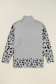 Gray turtleneck sweater with asymmetric leopard print sleeves and hem