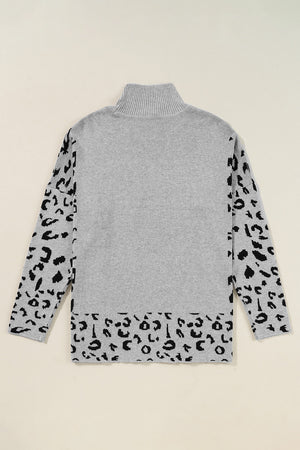 Gray turtleneck sweater with asymmetric leopard print sleeves and hem