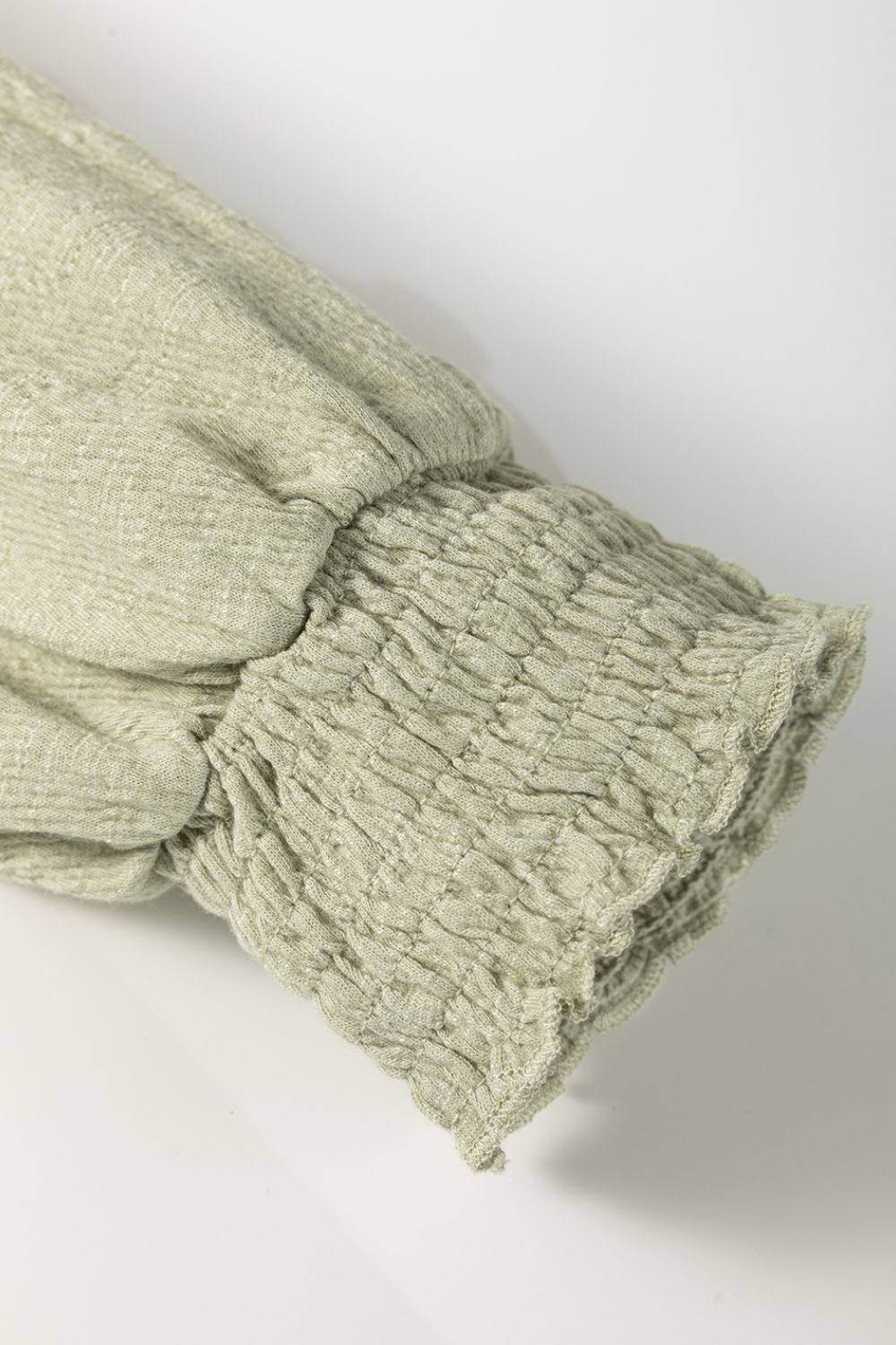Sage textured puff sleeve blouse with ruched elastic cuffs