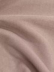 Lightweight open front cardigan in dusty pink, showing fabric texture and drape.