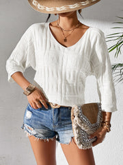 White textured knit dolman sleeve top with V-neck and 3/4 sleeves.