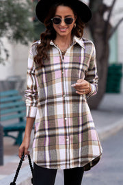 Oversized plaid shirt jacket tunic in blush pink and brown with button front and long sleeves.