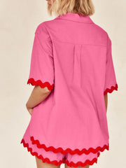 Hot pink shirt and shorts set with red scallop trim on sleeves and hem