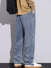 Relaxed fit denim jeans in Air Force Blue with drawstring waist and casual styling.