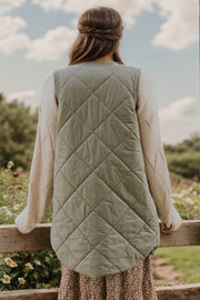 Sage quilted vest coat with diamond pattern, shown from the back.