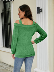 Mid Green cutout shoulder square neck blouse with long sleeves.