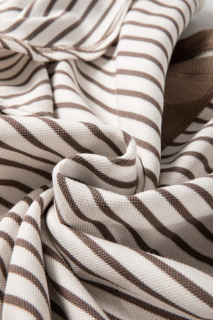 Brown and white striped tee with flounce sleeve detail.