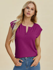Deep Purple knit tee with keyhole neckline and cap sleeves.