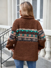 Brown sherpa quarter-zip pullover with Aztec print on sleeves and back.