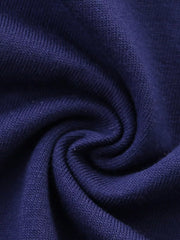 Navy blue cotton fabric detail of a baby outfit.
