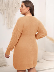 Sculpted knit midi dress in Sherbet with V-neck and textured sleeves.