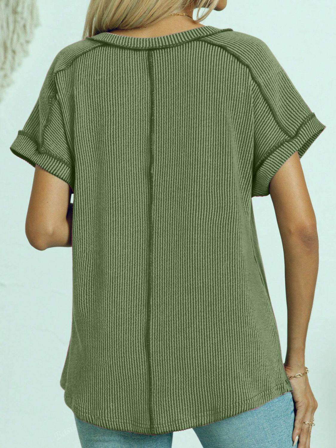 Matcha green ribbed v-neck tee with contrast stitching and cuffed short sleeves.