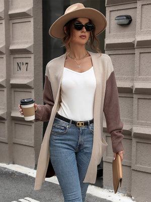 Colorblock knit longline cardigan in sand and brown acrylic with pockets.