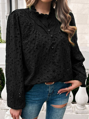 Black eyelet embroidered blouse with ruffle collar and button front.