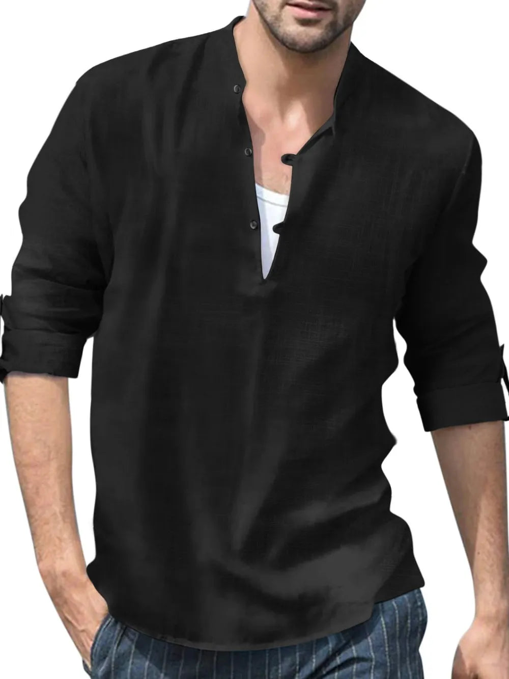 Black linen henley shirt with mandarin collar and roll-up sleeves, worn over a white tank top.