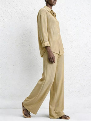 Chic striped two-piece set with button-down shirt and wide-leg pants in tan.