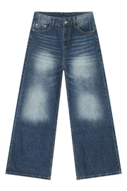 Faded wash balloon leg jeans in medium blue denim with a relaxed fit.