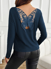 Dark Navy ribbed knit top with a sheer lace butterfly back detail.