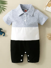 Color block polo collar baby romper in light gray, white, and black cotton.