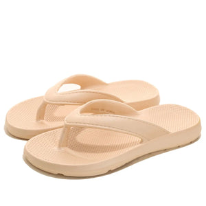 Apricot textured rubber thong sandals with a subtle waffle pattern on the footbed.