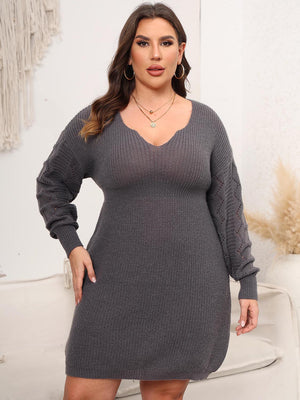 Sculpted knit midi dress in charcoal with V-neck and diamond detail on sleeves.