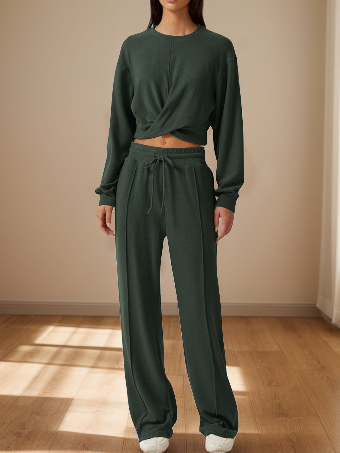 Army green knit lounge set with a cross-front crop top and wide-leg pants.
