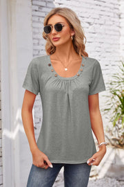 Gray short sleeve top with gathered yoke and button trim