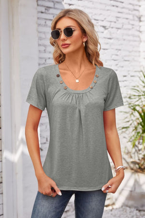 Gray short sleeve top with gathered yoke and button trim