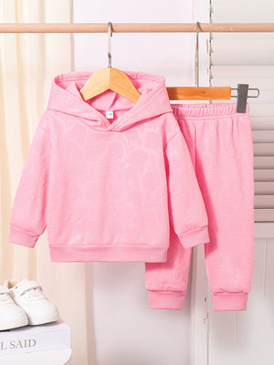 Pink embossed floral baby hoodie and pants set.