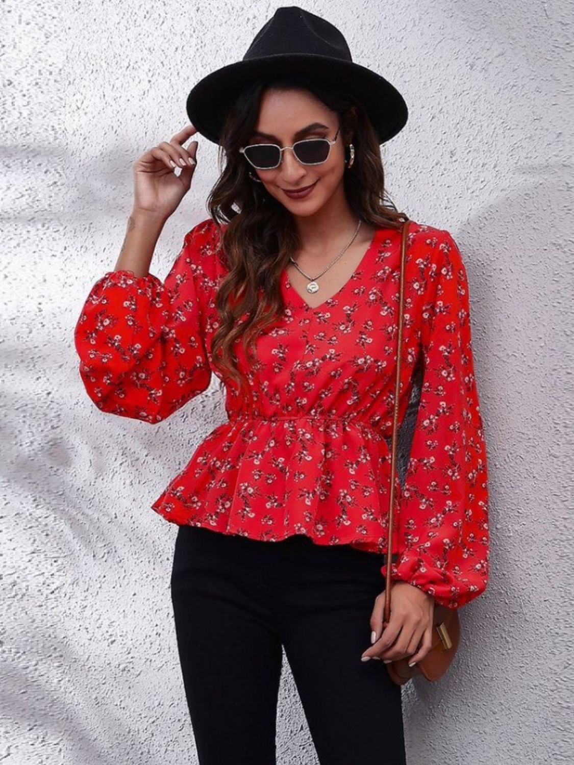 Red floral peplum blouse with gathered waist and bishop sleeves