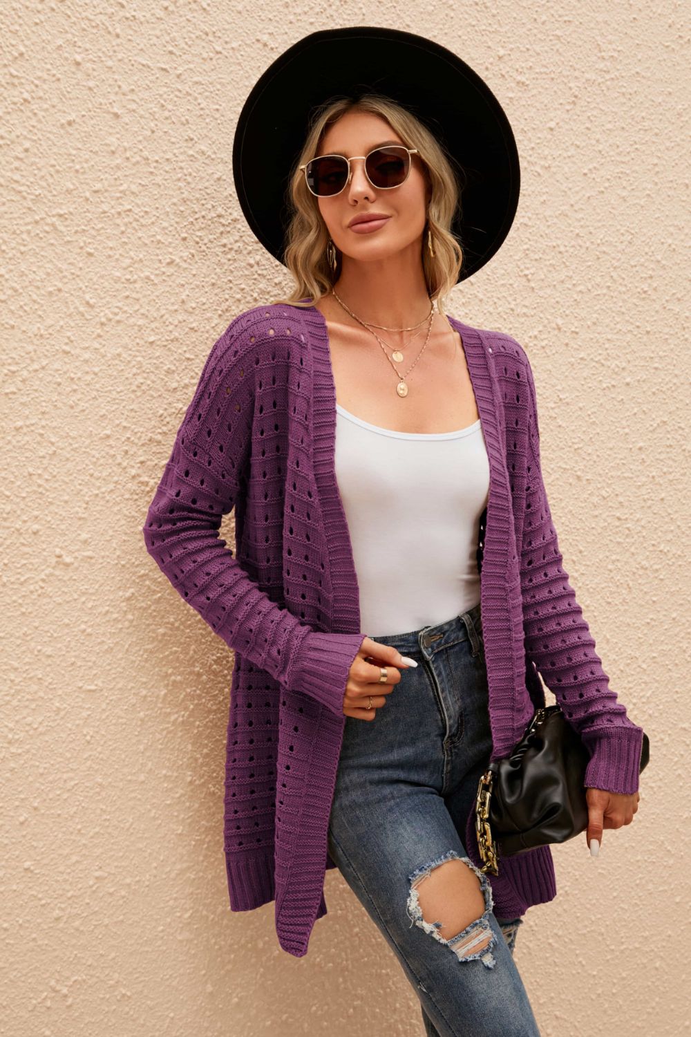 Purple perforated knit longline cardigan with open front and long sleeves.