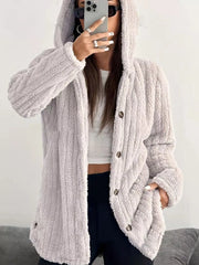 Light grey button-up fleece jacket with hood and cozy texture.