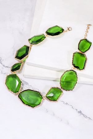Green resin stone collar necklace with gold alloy setting and clasp.
