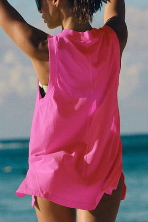 Oversized hot pink V-neck tank top with a pocket detail and side slits.