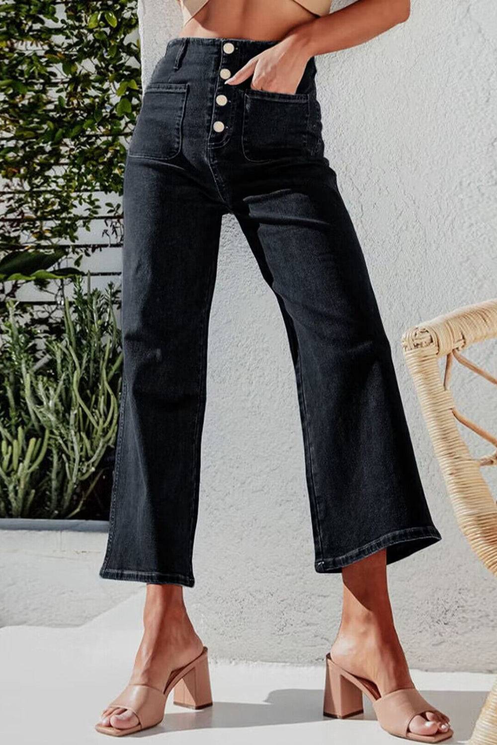 Black button-front cropped wide-leg jeans with utility pockets