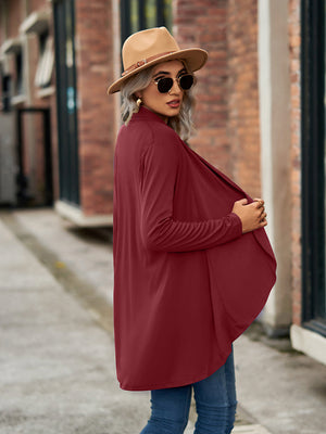 Draped cascade cardigan in wine with open front and long sleeves.