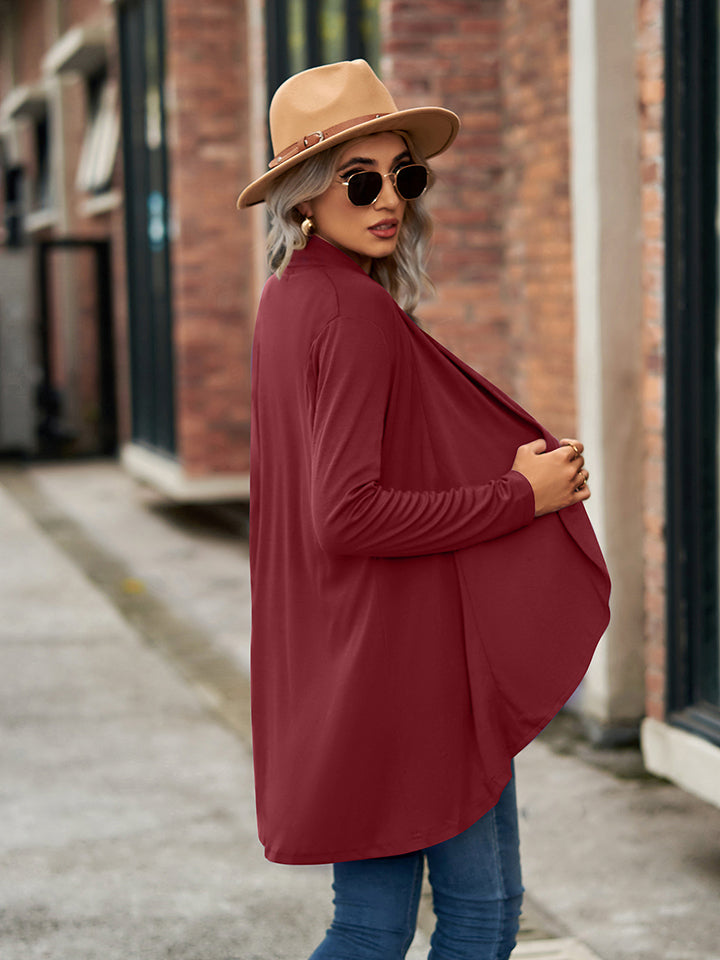 Draped cascade cardigan in wine with open front and long sleeves.